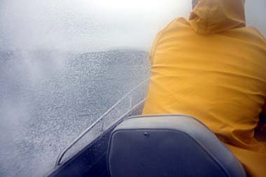 Wave splashes into boat